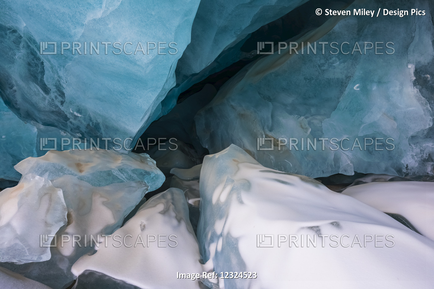 Pieces Of Collapsed Ice Inside A Black Rapids Glacier Cave; Alaska, United ...